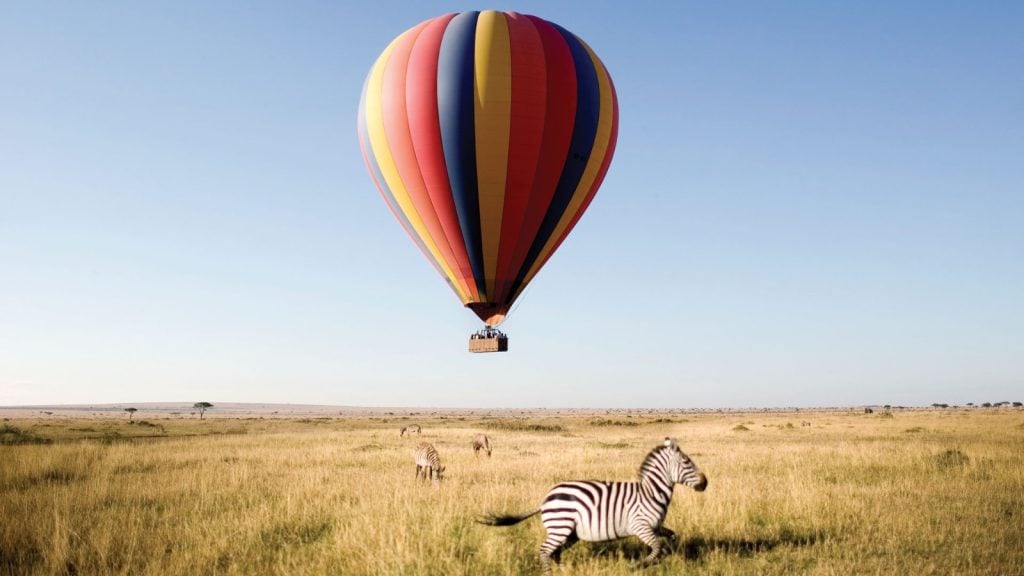 flying in hot air balloon during a luxury safari