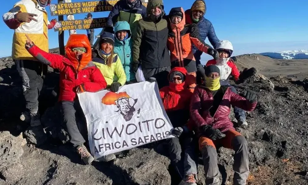 Kiwoito Africa Safaris Trekkers celebrates uhuru peak